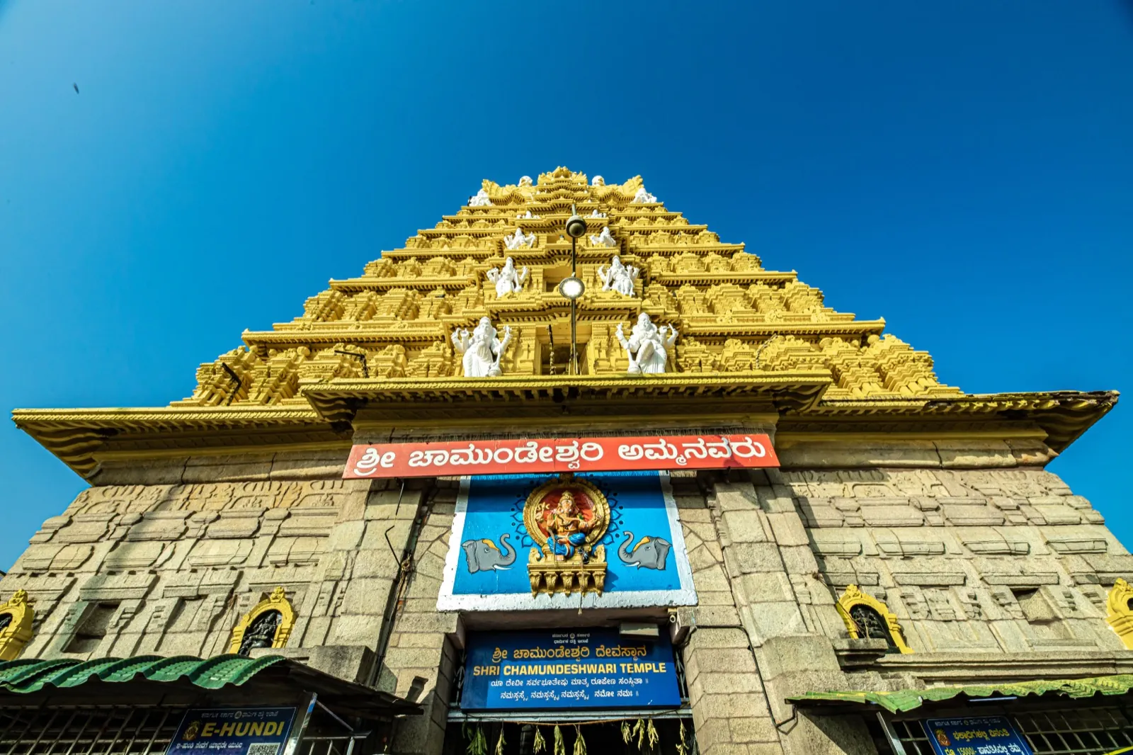 Main entrance of Sri Chamundeshwari Devi Temple under blue sky